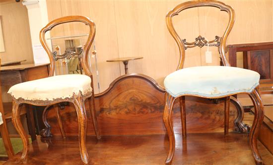 A pair of Victorian rosewood balloon back dining chairs
